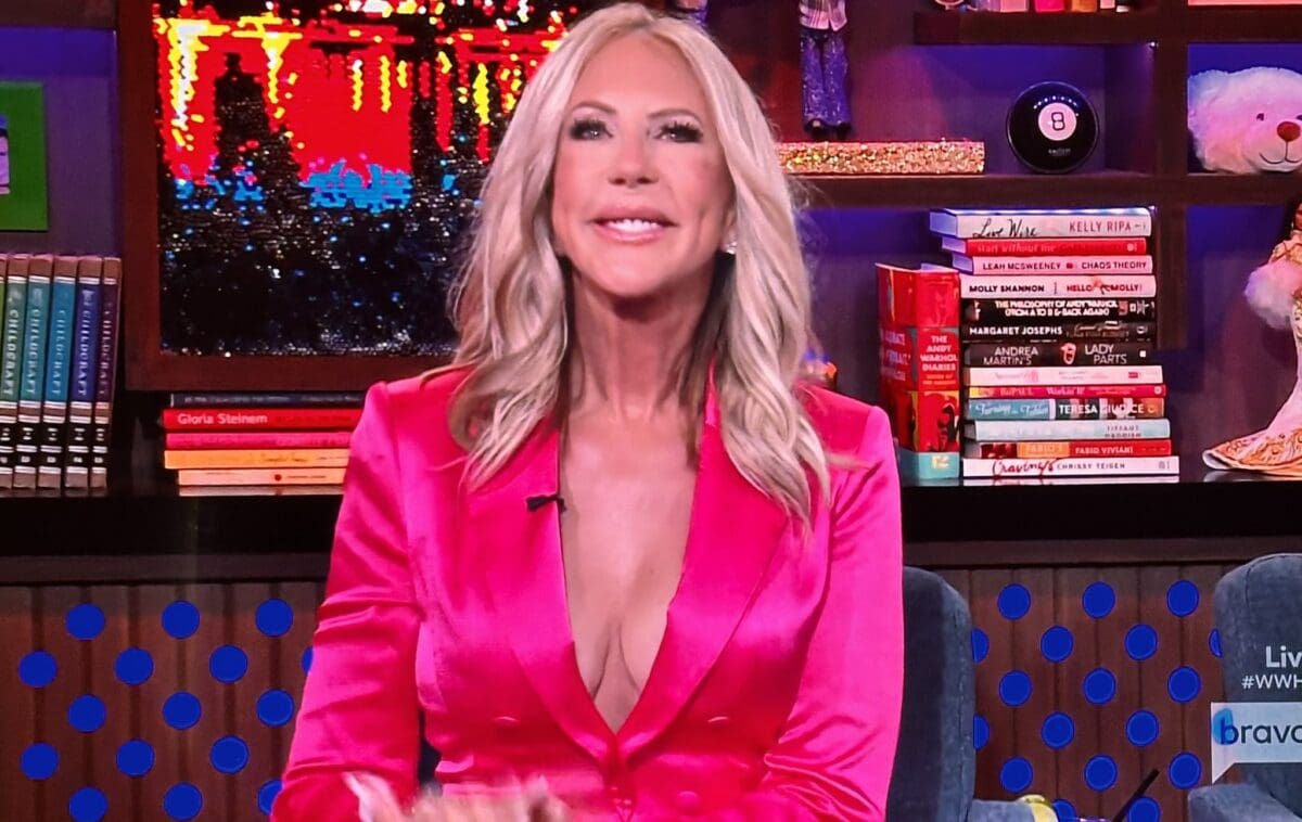 Vicki Gunvalson Says She Was Left Out of RHOC Season 19 and Confronted by Andy Cohen Over Bravo Remarks 7 RHOC OG Vicki Gunvalson smiles happily on WWHL while wearing pink satin suit