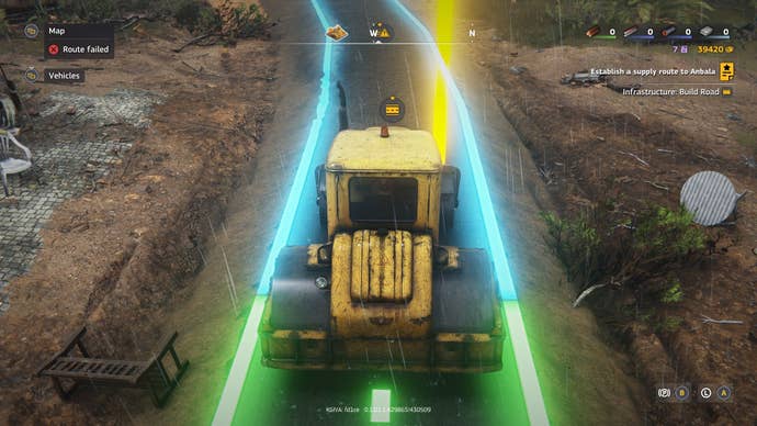 An asphalter paves a new road as guided by glowing blue lines.