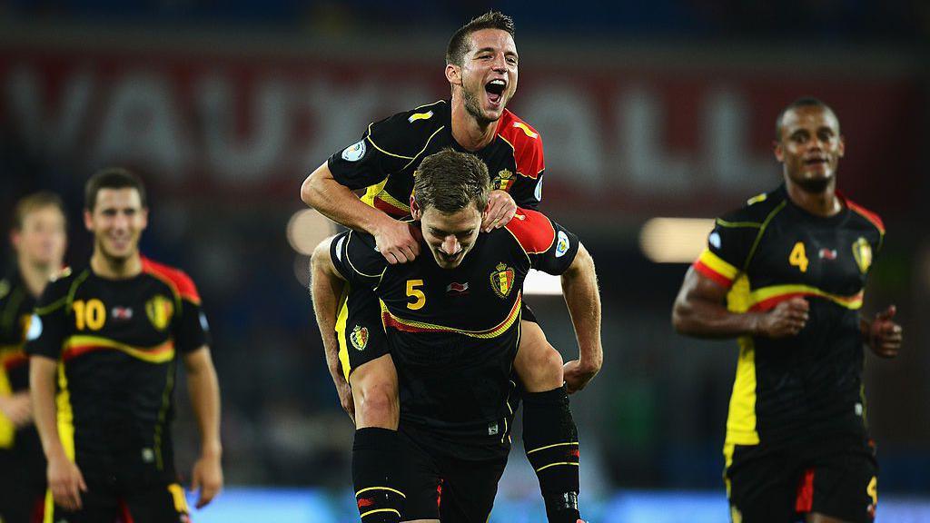 Eden Hazard, Jan Vertonghen, Dries Mertens and Vincent Kompany celebrate a goal for Belgium against Wales