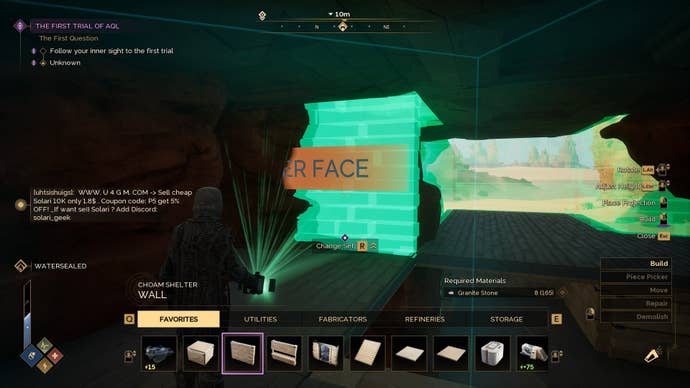 The player uses a tool to build a base using green holograms.