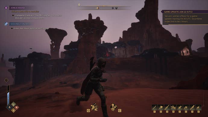 The player runs through the desert at dusk.