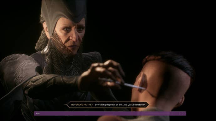 A Bene Gesserit holds a needle at the neck of the player.