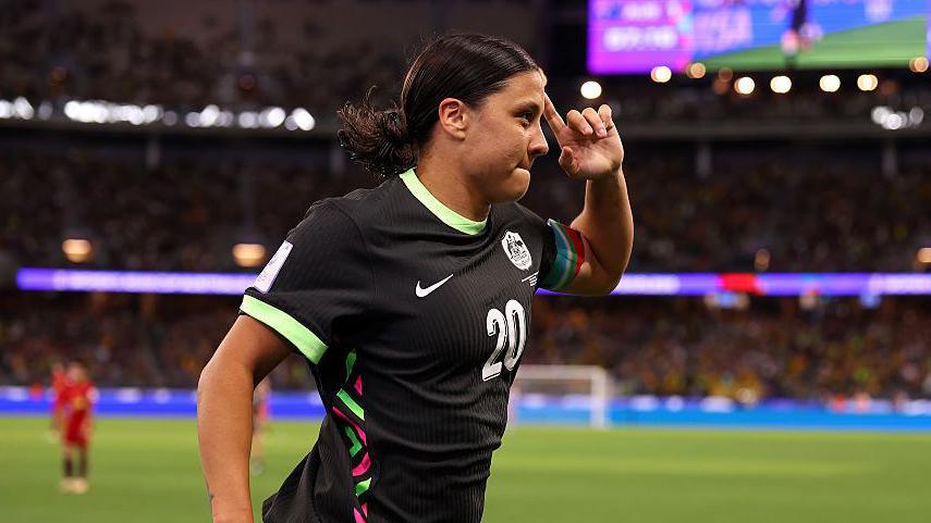 Sam Kerr celebrates after scoring in semi-final against China PR