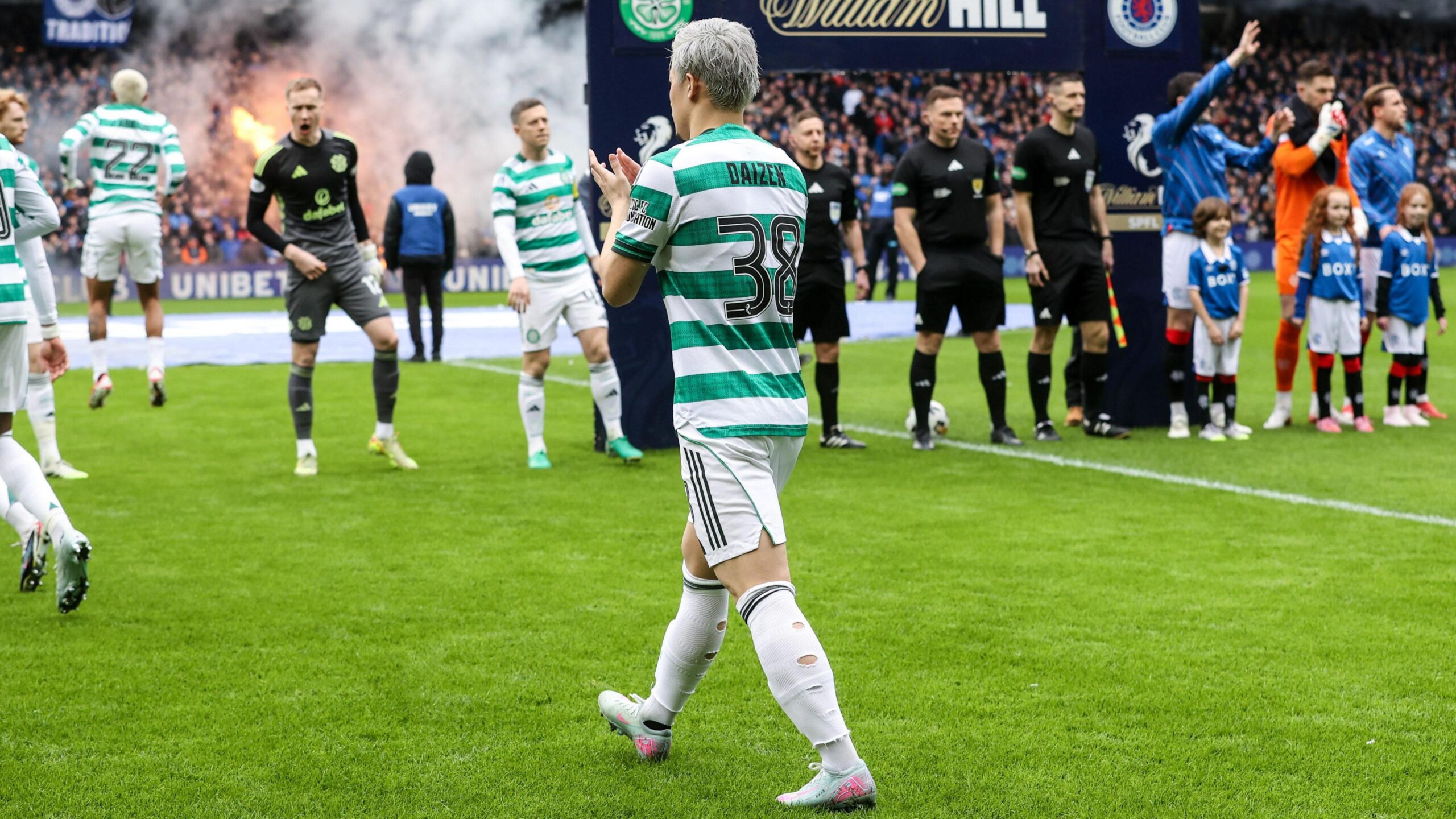 Celtic take to the field at Ibrox