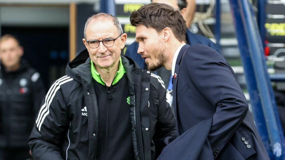 Rangers head coach Danny Rohl (R) and Celtic interim manager Martin O'Neill shake hands during a Premier Sports Cup Semi-Final match between Celtic and Rangers at Hampden Park, on November 02, 2025, in Glasgow,