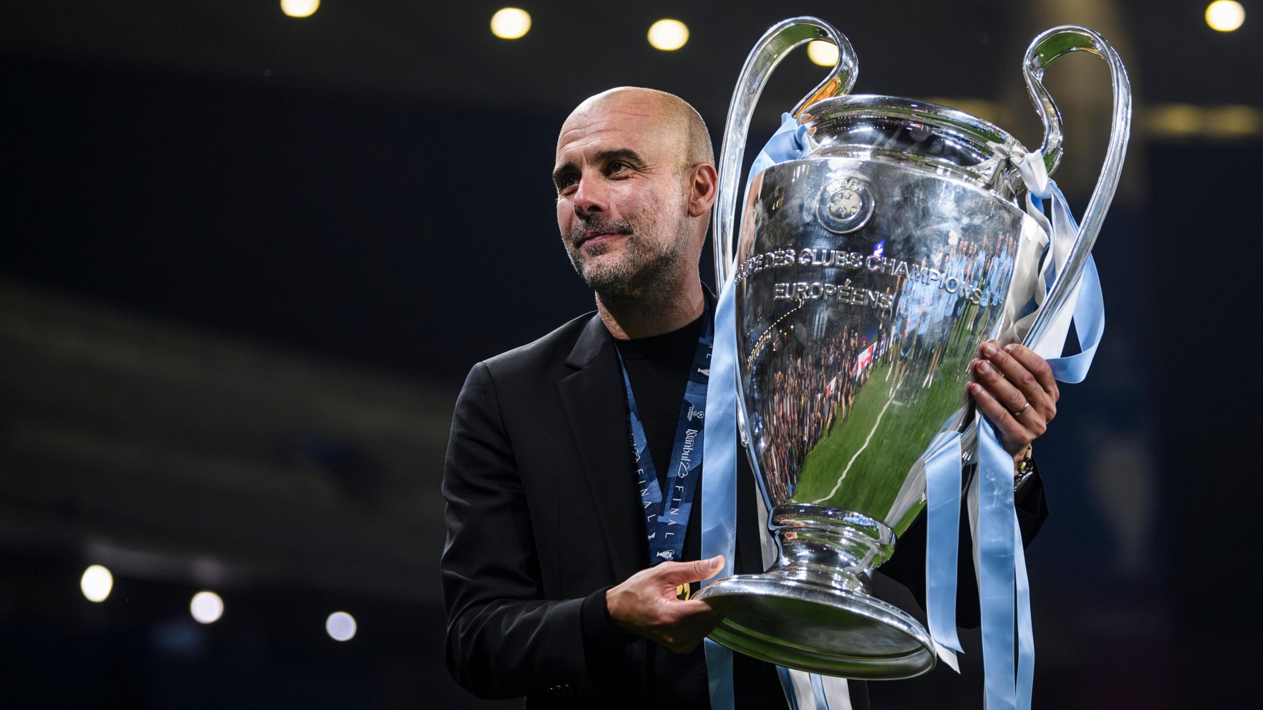 Pep Guardiola with Champions League trophy in 2023