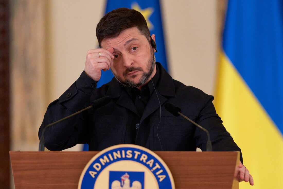 Ukrainian President Volodymyr Zelenskyy gestures during a joint news conference with Romanian President Nicusor Dan at the Cotroceni Presidential Palace in Bucharest, Romania, Thursday, March 12, 2026.